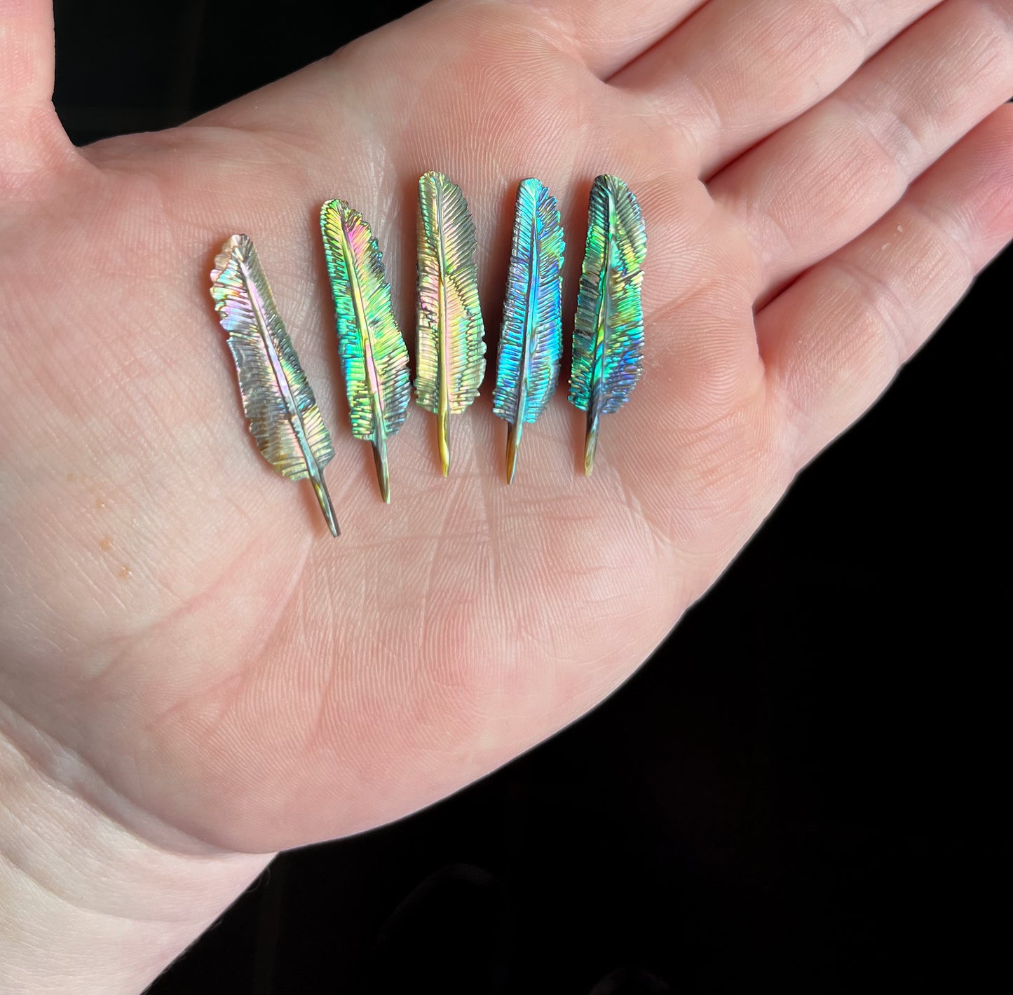 Small hand carved feathers- paua shell- cost per feather