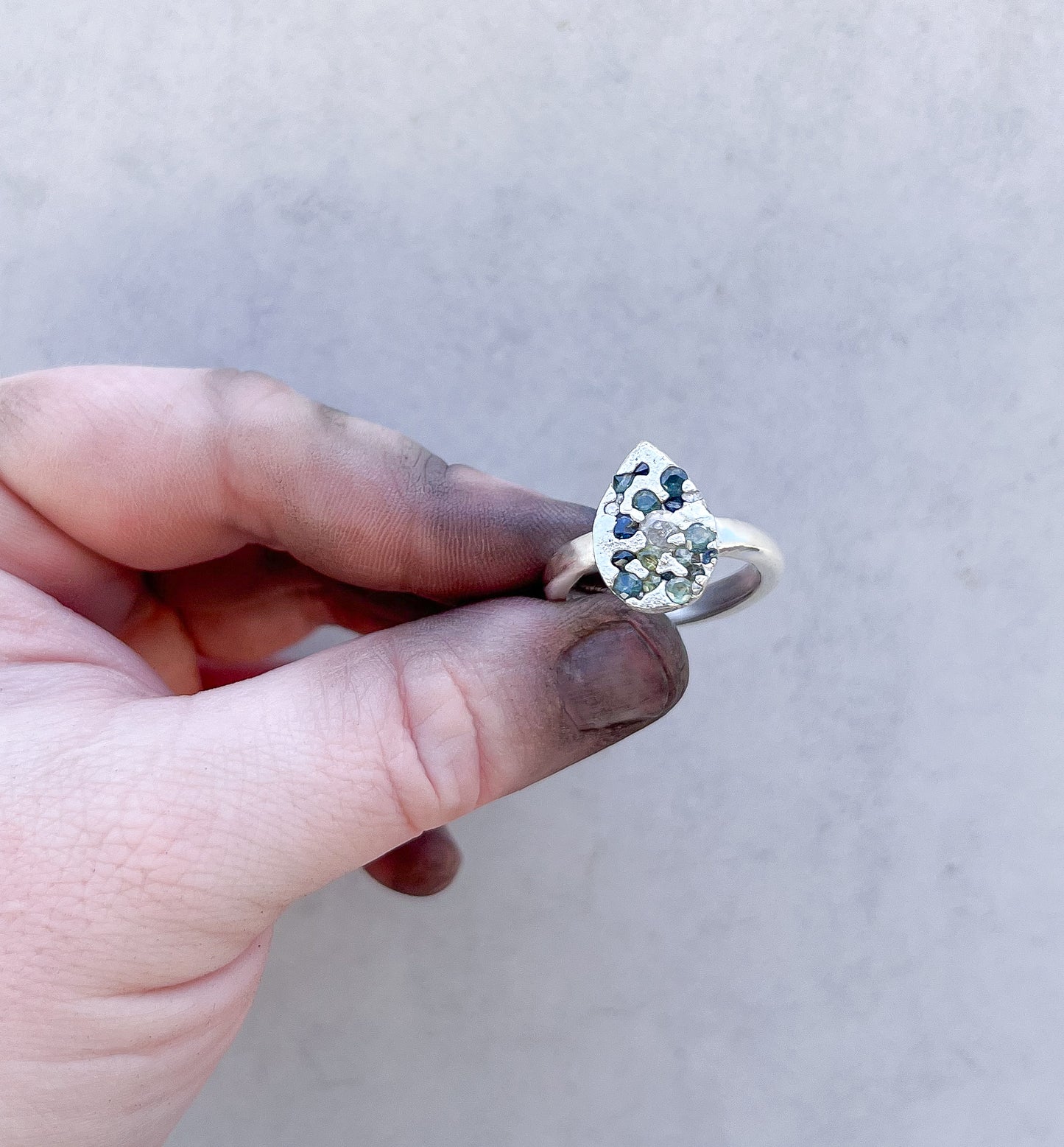 Sand cast silver ring- with Australian sapphires and diamonds.