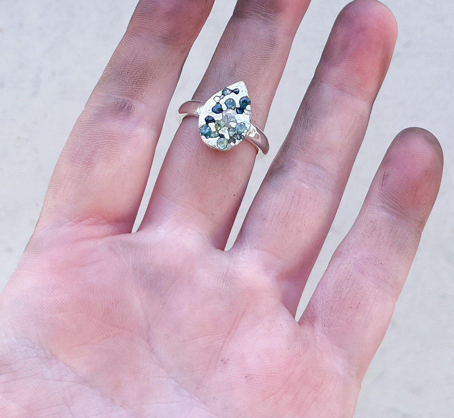 Sand cast silver ring- with Australian sapphires and diamonds.