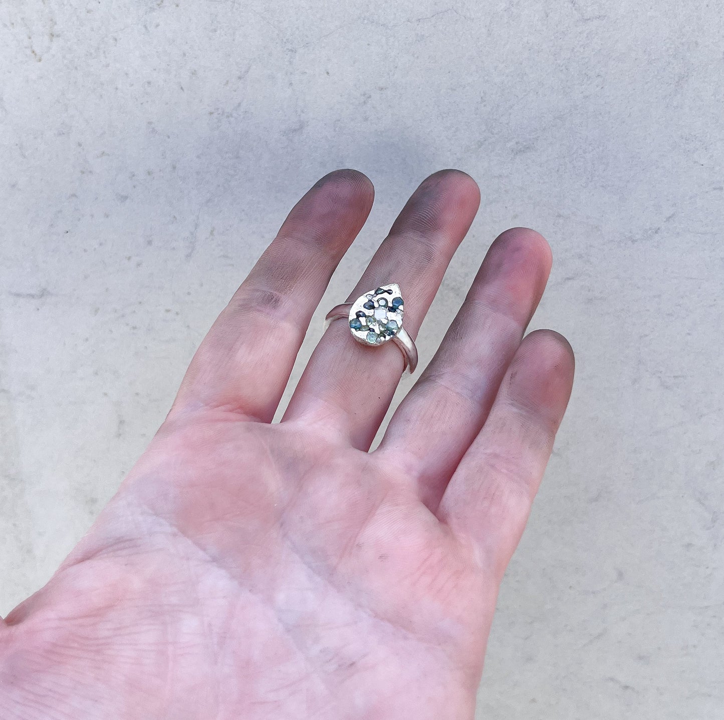 Sand cast silver ring- with Australian sapphires and diamonds.